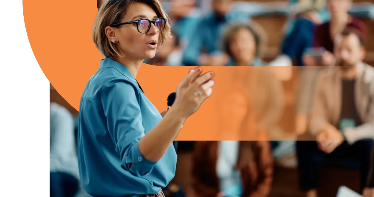 Educator speaking at a conference